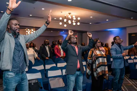 Hands raised in worship